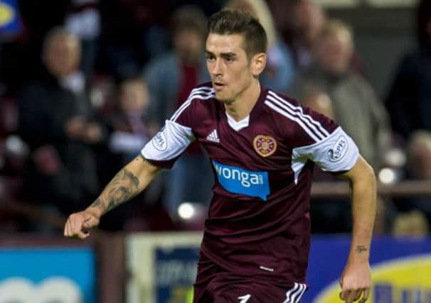 Jamie Walker, pictured in action for Hearts, faces 10 weeks on the sidelines after fracturing his metatarsal. Picture: SNS