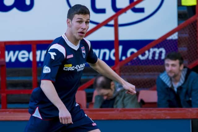 Filip Kiss got his Scottish football career off to a flyer: Two goals, a booking and an injury. Picture: SNS