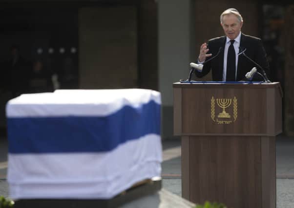 Former British Prime Minister Tony Blair delivers a speech at Ariel Sharon's memorial. Picture: AP