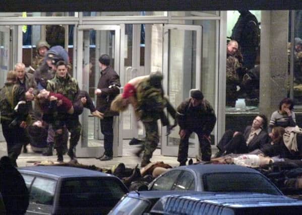 The siege at a Moscow theatre was exploited by Putin to increase his grip on power. Picture: AFP/Getty