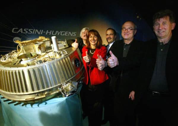 Nasa and European Space Agency experts celebrate the landing of the Huygens probe in 2005. Picture: Getty