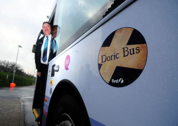 Davie Davidson, a 50-year-old Doric speaker from Peterhead, aboard the new Doric Bus. Picture: Hemedia