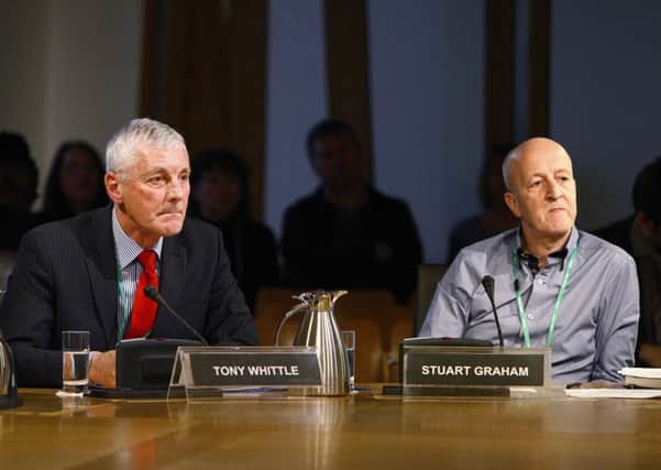 Stuart Graham, right and retired police detective Tony Whittle give evidence to the Scottish Parliament. Picture: Andrew Cowan