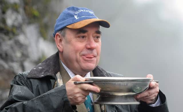 First  Minister Alex Salmond starts the salmon fishing season on the River Tay. Picture: Neil Hanna