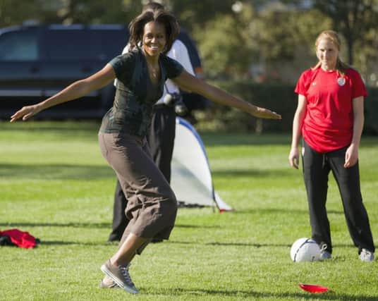 Michelle Obama says women should have the freedom to do anything to look good. Picture: AP