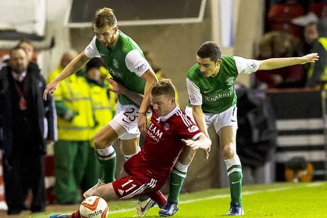 Alex Harris, right, made a brief comeback against Aberdeen last Friday. Picture: SNS