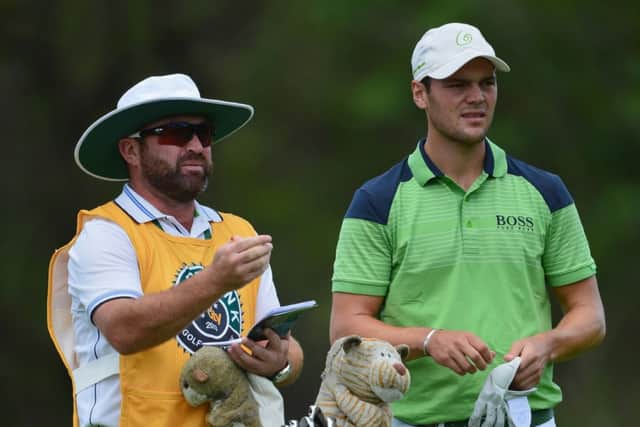 Martin Kaymer with his caddie Craig Connelly who, he says, keeps him fully focused. Picture: Getty