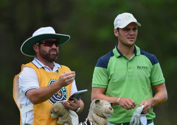 Martin Kaymer with his caddie Craig Connelly who, he says, keeps him fully focused. Picture: Getty