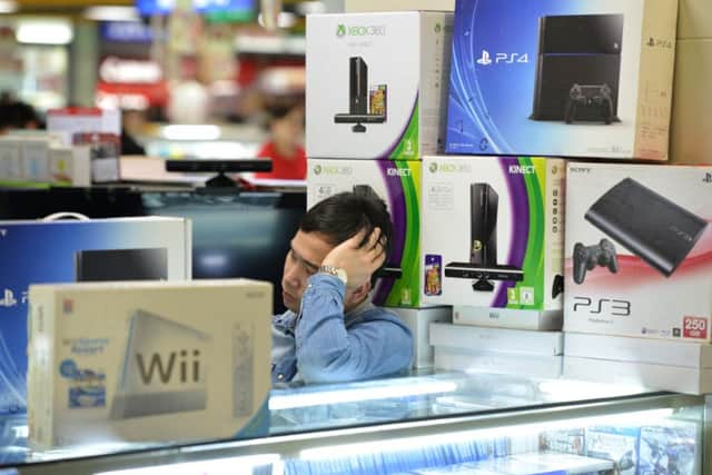 Xbox One and Sony PS4 sales helped Game Group over the festive period. Picture: Getty