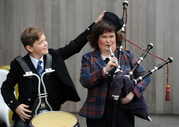Susan Boyle and piper Lee McIver at the launch at the Bathgate Partnership Centre today. Picture: Ian Rutherford