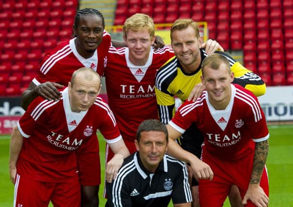 Gregg Wylde, far right, made just four starts for Aberdeen after joining the club in the summer. Picture: SNS