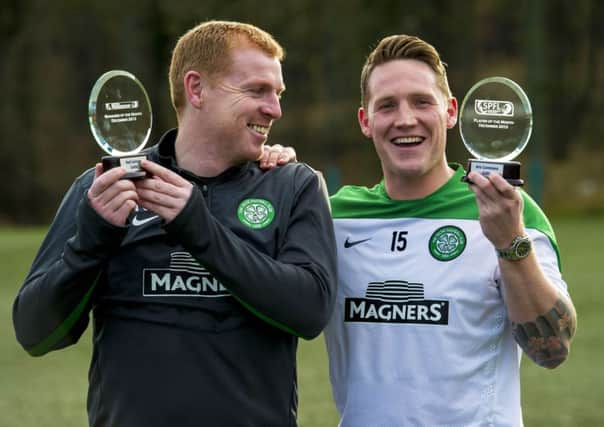 Kris Commons and manager Neil Lennon pick up the SPFL Scottish Championship Player and Manager of the Month respectively. Picture: SNS