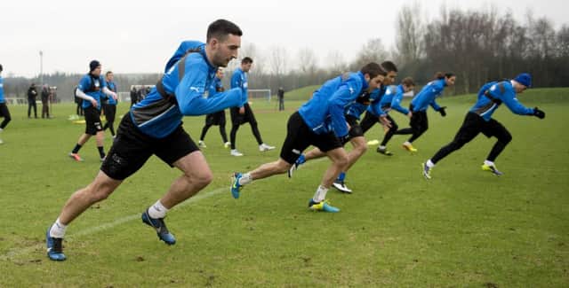 Rangers players are put through their paces at training this morning. Picture: SNS