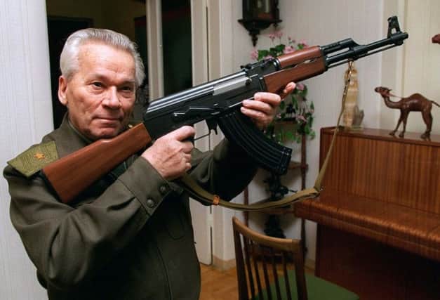 Kalashnikov with a model of his AK-47 assault rifle. Picture: AP