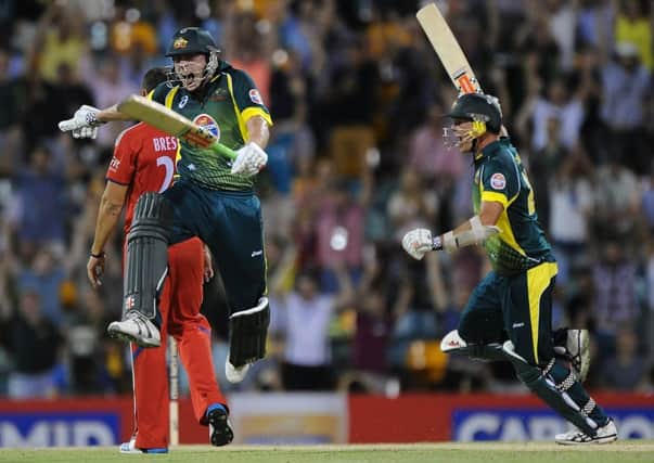James Faulkner, left, and Clint McKay of Australia celebrate their dramatic onewicket win. Picture: Getty
