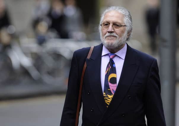 Dave Lee Travis groaned and sighed yesterday as a witness gave her testimony. Picture: Getty