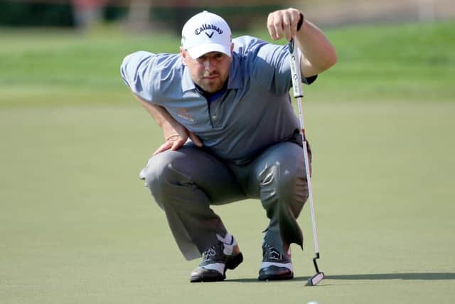 Craig Lee of Scotland lines up a putt at the 17th during the second day. Picture: Getty