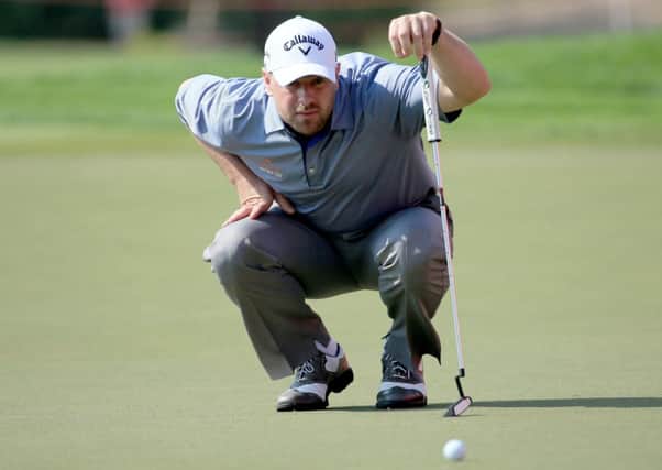 Craig Lee of Scotland lines up a putt at the 17th during the second day. Picture: Getty
