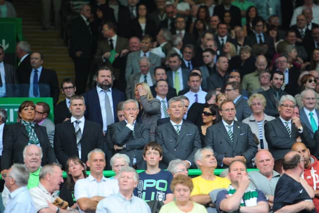 Celtic chief executive Peter Lawwell, centre, has been driving proposals to introduce safe standing areas to Parkhead. Picture: Robert Perry