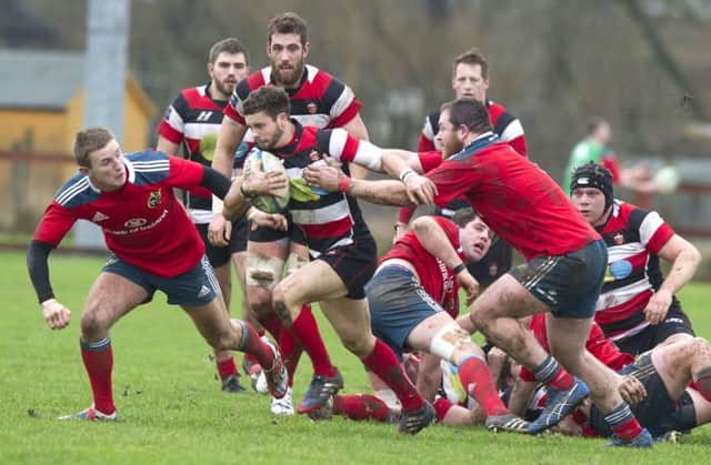 Stirling centre Sean Kennedy breaks away as County try to break the Munster stranglehold. Picture: SNS/SRU