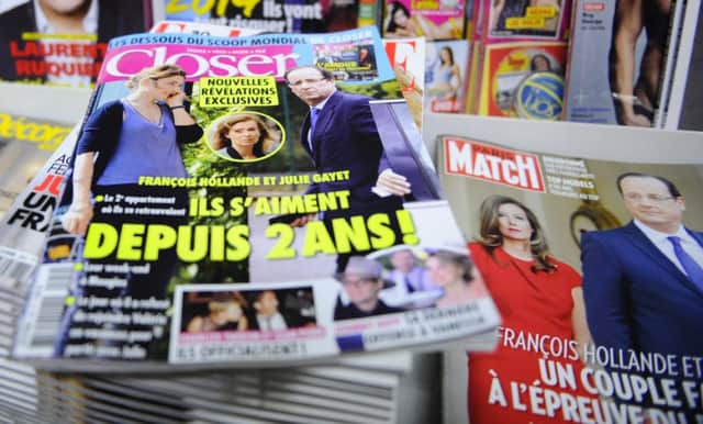 Celebrity news magazines headlining on French President Francois Hollande. Picture: AP