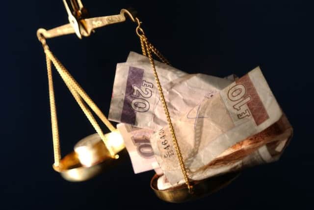 Experts are demanding answers on currency ahead of Septembers referendum. Picture: TSPL