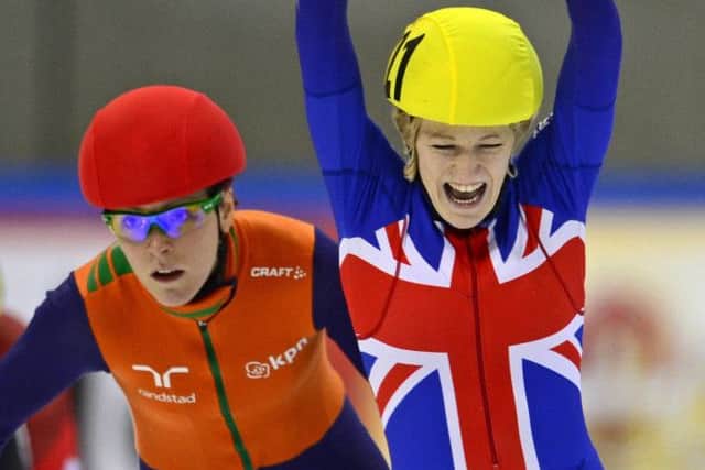 Elise Christie celebrates next to the Jorien Ter Mors after retaining her European title Picture: Getty