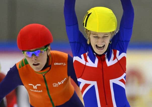 Elise Christie celebrates next to the Jorien Ter Mors after retaining her European title  Picture: Getty