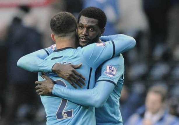 Emmanuel Adebayor, right, was on song. Picture: Reuters