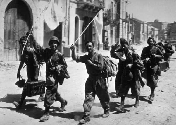 Italian soldiers surrender in Sicily to place themselves under the jurisdiction of the Allies. Picture: Getty