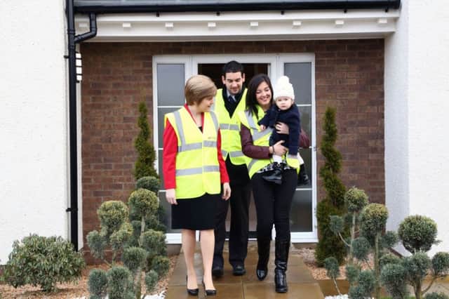 Nicola Sturgeon with homeowners on the day figures for the new Help to Buy initiative were revealed. Picture: Contributed