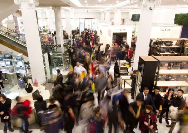 Improving the quality of goods and driving down prices will allow consumers to shop more. Picture: AFP/Getty