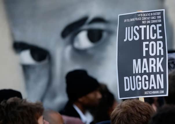 A vigil for Mark Duggan outside Tottenham Police station on January 11. Picture: Getty