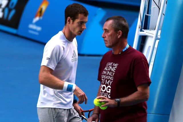 Andy Murray and coach Ivan Lendl plot their tactics against Roger Federer. Picture: AP