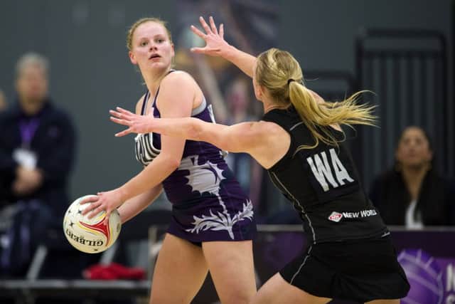 PE teacher Claire Brownie, left, in action for Scotland against New Zealand. Picture: SNS