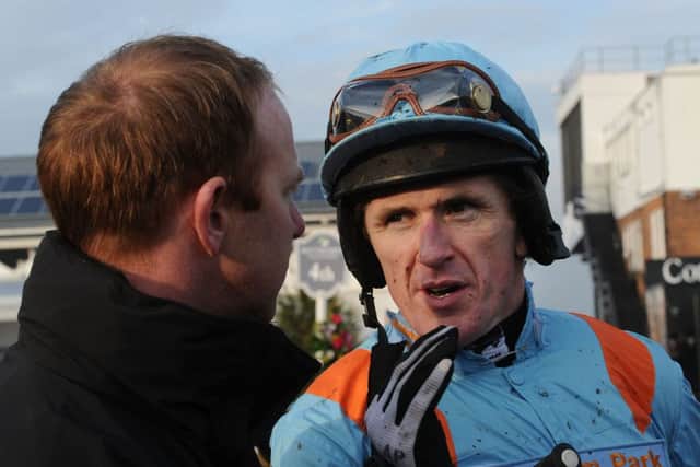 Tony McCoy chats to trainer David OMeara after riding Rose of the Moon to victory. Picture: PA