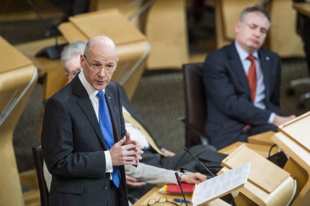 John Swinney debates the budget in the Scottish Parliament. Picture:  Ian Georgeson