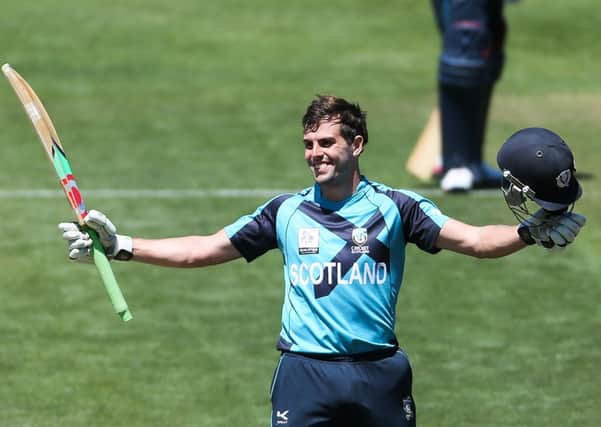 Calum Macleod of Scotland celebrates as he reaches his century during the match between Scotland and Canada. Picture: Getty