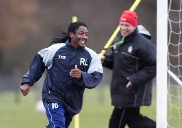 Russell Latapy and John Hughes during 'Yogi''s spell at Falkirk. Picture: SNS