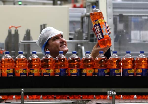 Irn Bru bottles in the production hall at AG Barr's Irn Bru factory in Cumbernauld. Picture: PA