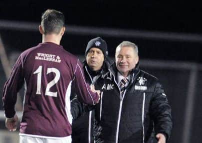 Gemmell and McCoist shake hands after the game. Picture: Johnston Press