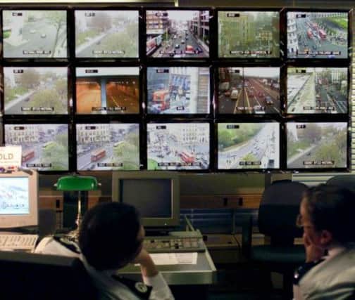 Police control rooms in Scotland face cuts. Picture: PA