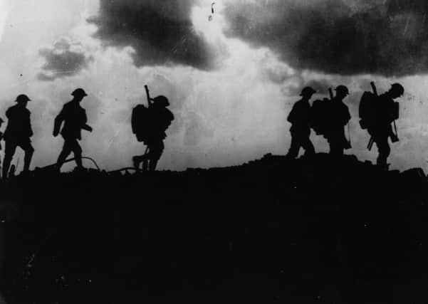 British troops moving up to the trenches, 2.5 miles East of Ypres, in 1917. Picture: Getty