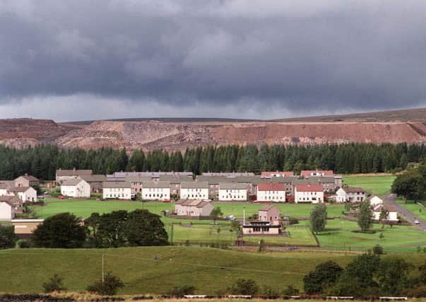 The Scottish Coal Company's open cast mine loomed over the village of  Muirkirk. Picture: Allan Milligan