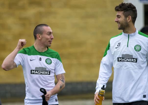 Scott Brown (left) chats with Charlie Mulgrew during Friday's training session. Picture: SNS