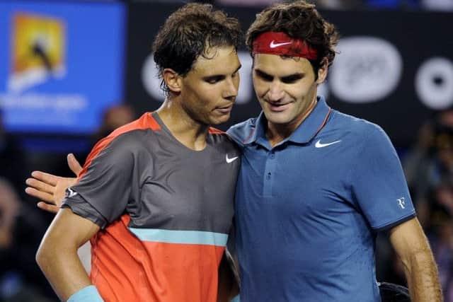 Rafael Nadal embraces Roger Federer after their semifinal. Picture: AP