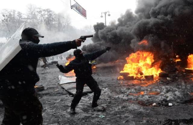 Anti-government protesters clashe with riot police in Kiev. Picture: Getty