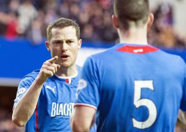 Jon Daly (left) celebrates with Lee Wallace after the Irishman's goal. Picture: PA