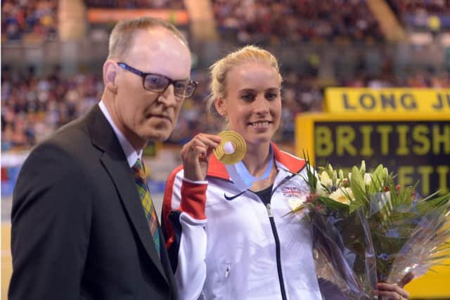 Lynsey Sharp received her European gold medal from father Cameron. Picture: Phil Wilkinson