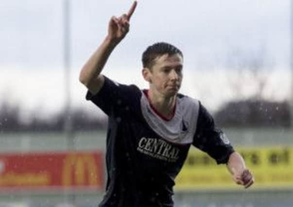Conor McGrandles celebrates his opener for Falkirk. Picture: SNS
